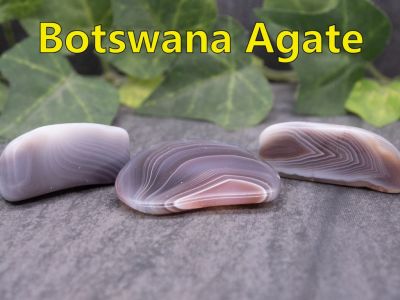 Botswana Agate
Botswana Agate—known for its fine, flowing pastel bands—forms in ancient volcanic lava flows, often shows “eye” patterns, is considered unusually protective in folklore, and is prized for its durability and soft, smoky colors.
