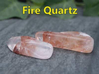 Fire Quartz
Fire Quartz specifically is also known as Hematoid Quartz. The red “flames” within the Clear Quartz are streaks of Hematite.  This material comes from  Madagascar.

