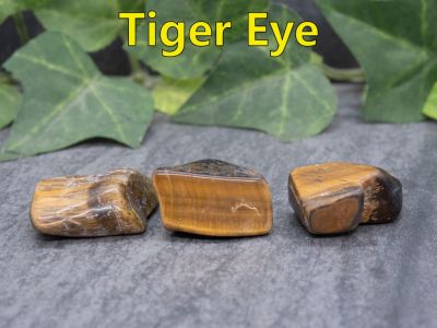 Tiger Eye
Tiger Eye is a form of Chalcedony that is famous for what is known as “chatoyancy” which is what gives it that silky wavy shimmering effect.  This material comes from South Africa.


